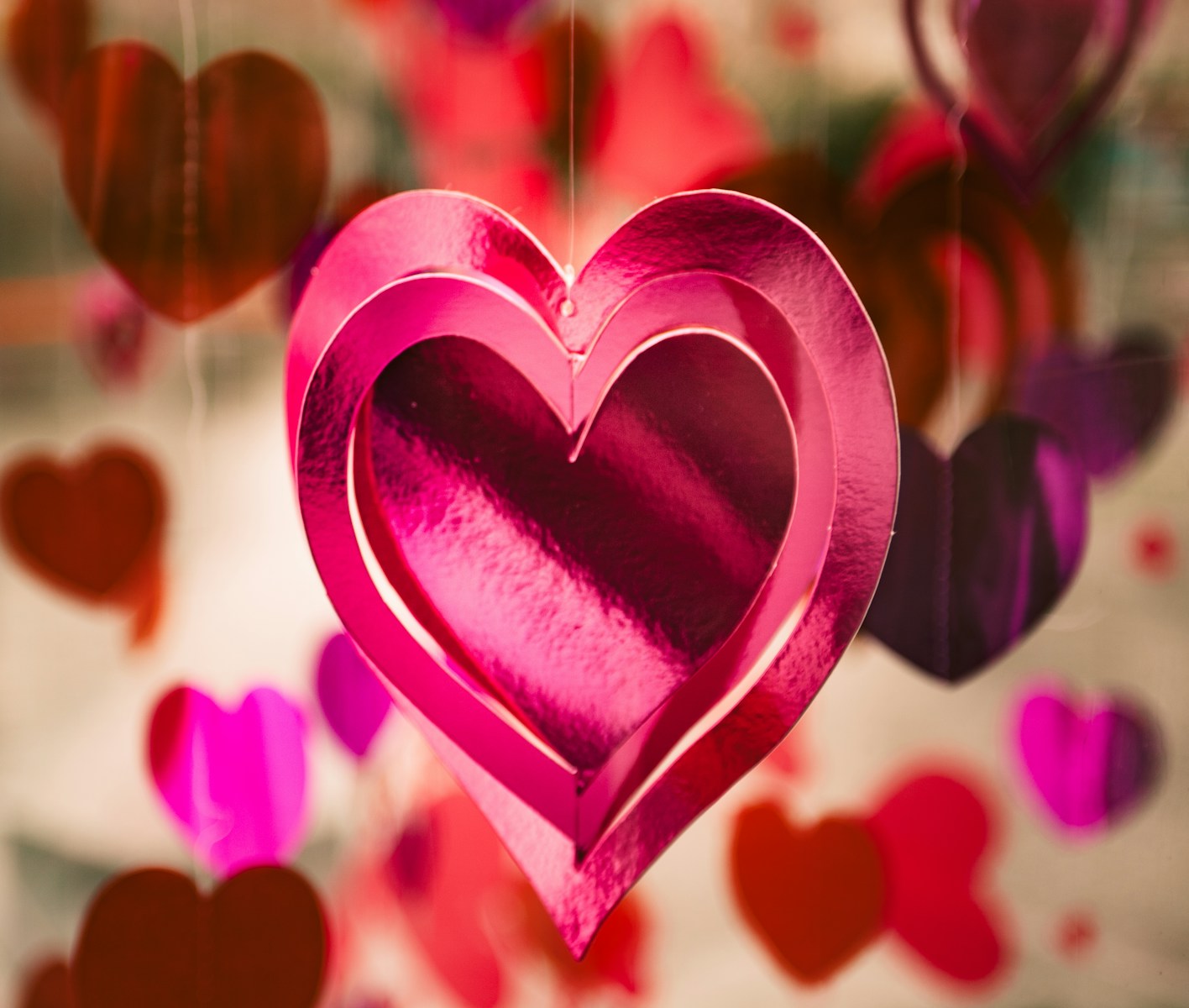 Photo by Clem Onojeghuo pink heart hanging ornament